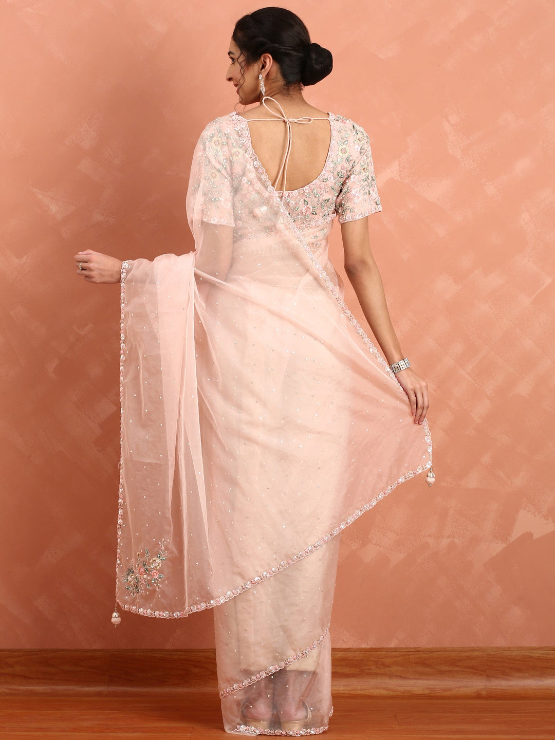 Neerus Orange organza embroidered saree - back view