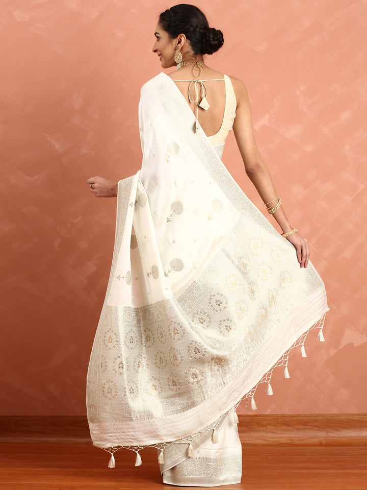 Neerus White Banarasi woven silk saree with zari border - side view