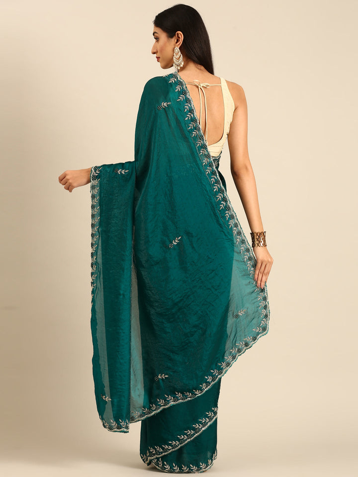 Neerus Green tissue embellished saree - back view