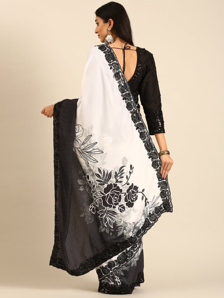 Neerus Black satin hand embroidered printed saree - back view