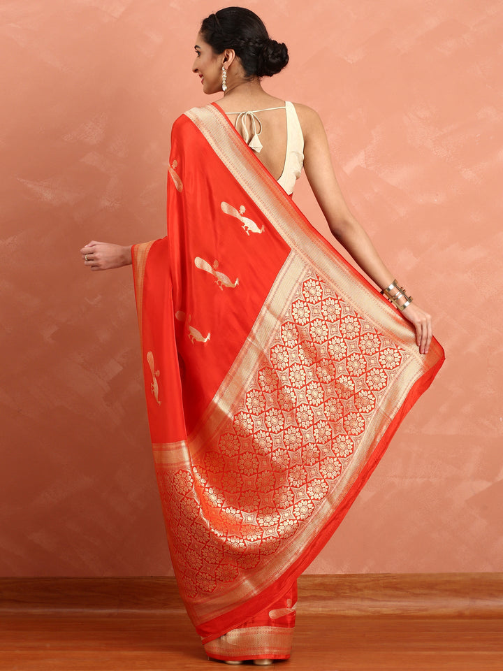 Neerus Red silk woven saree with peacock booti pallu - side view