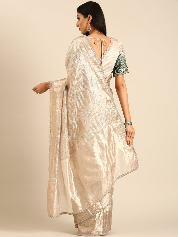 Neerus Grey tissue woven saree with green contrast blouse - back view