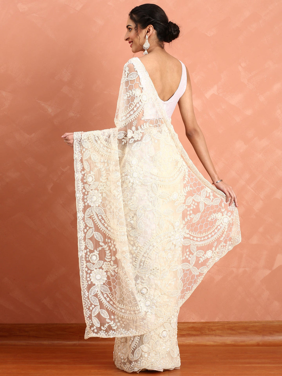Neerus Beige net hand embroidered saree with pearl sequins - side view