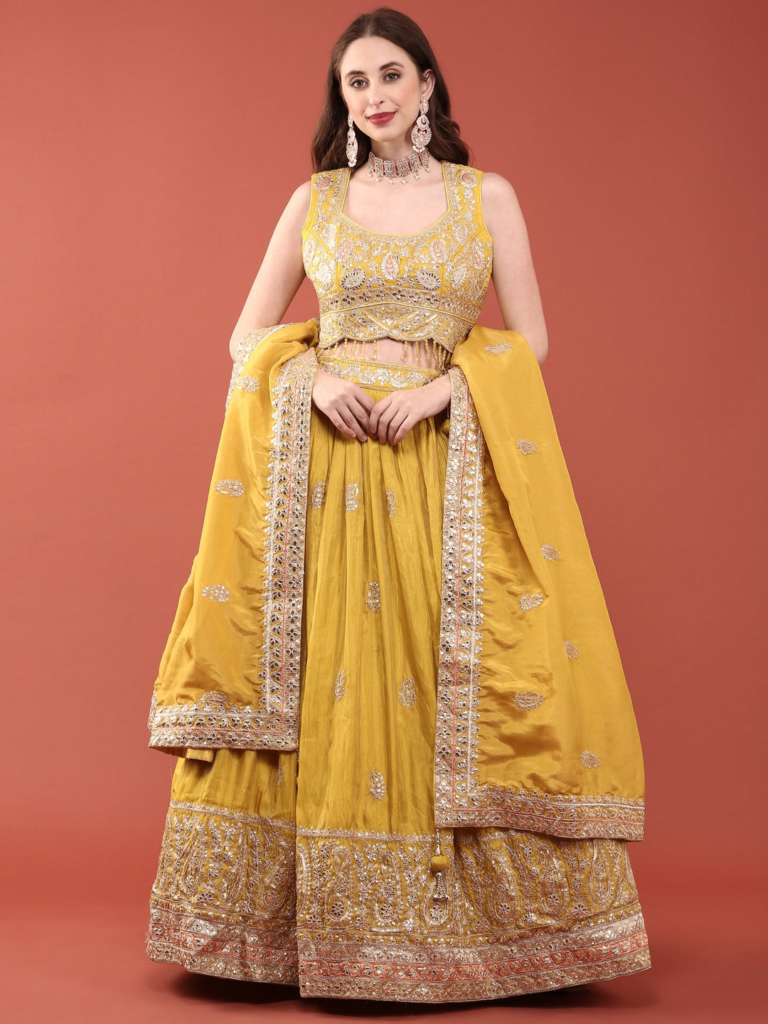 Neerus Yellow silk embroidered lehenga set - back view
