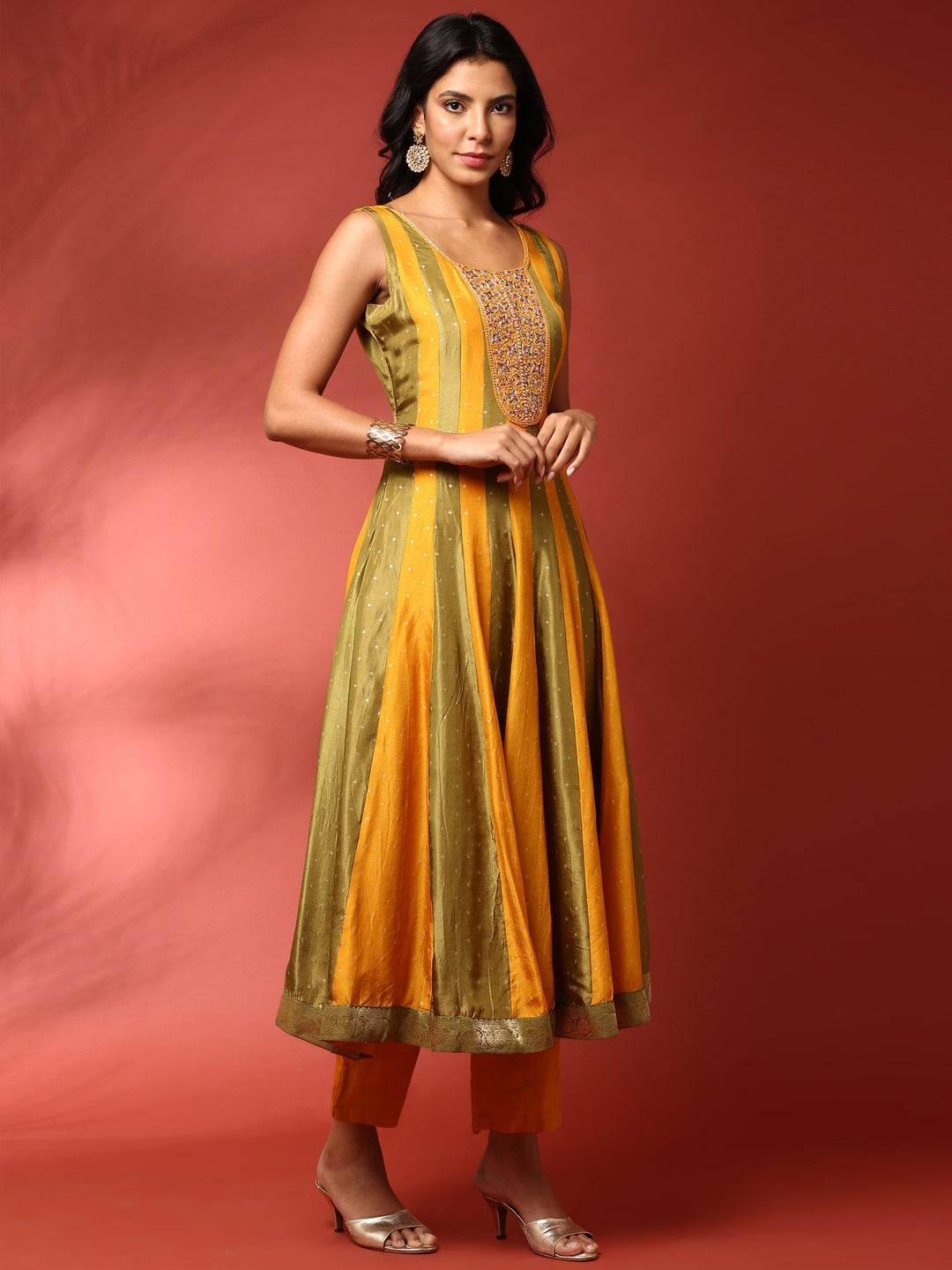 Neerus Yellow silk embroidered anarkali suit set - side view