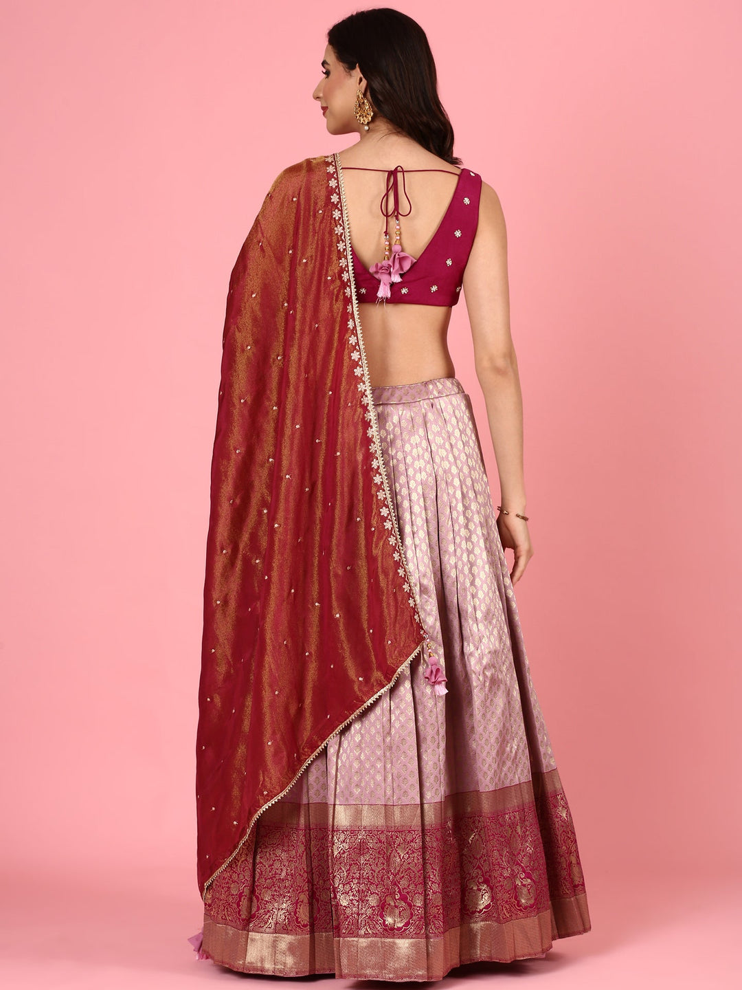 Neerus Pink silk embroidered lehenga set - side view