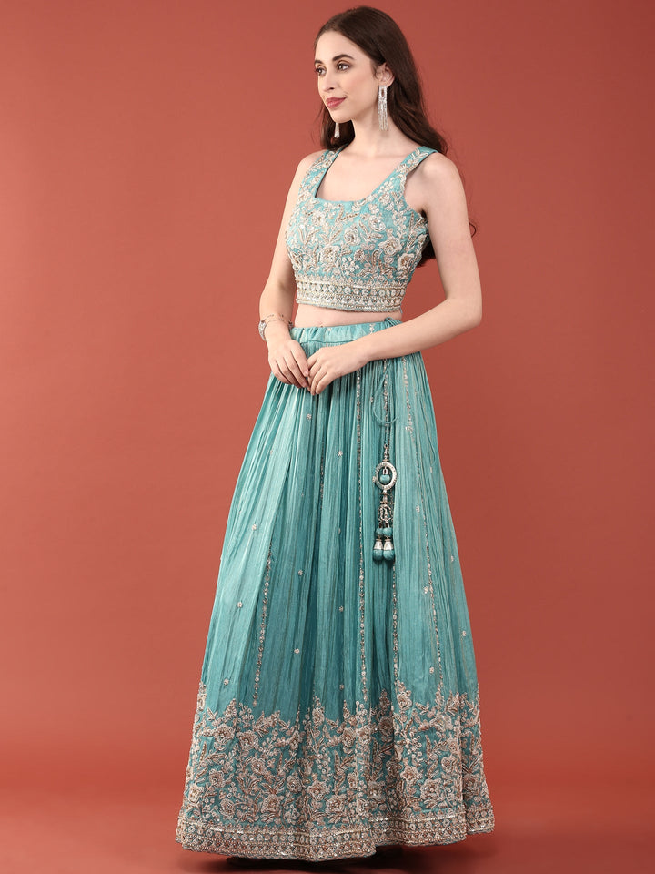 Neerus Green tissue hand embroidered lehenga set - side view