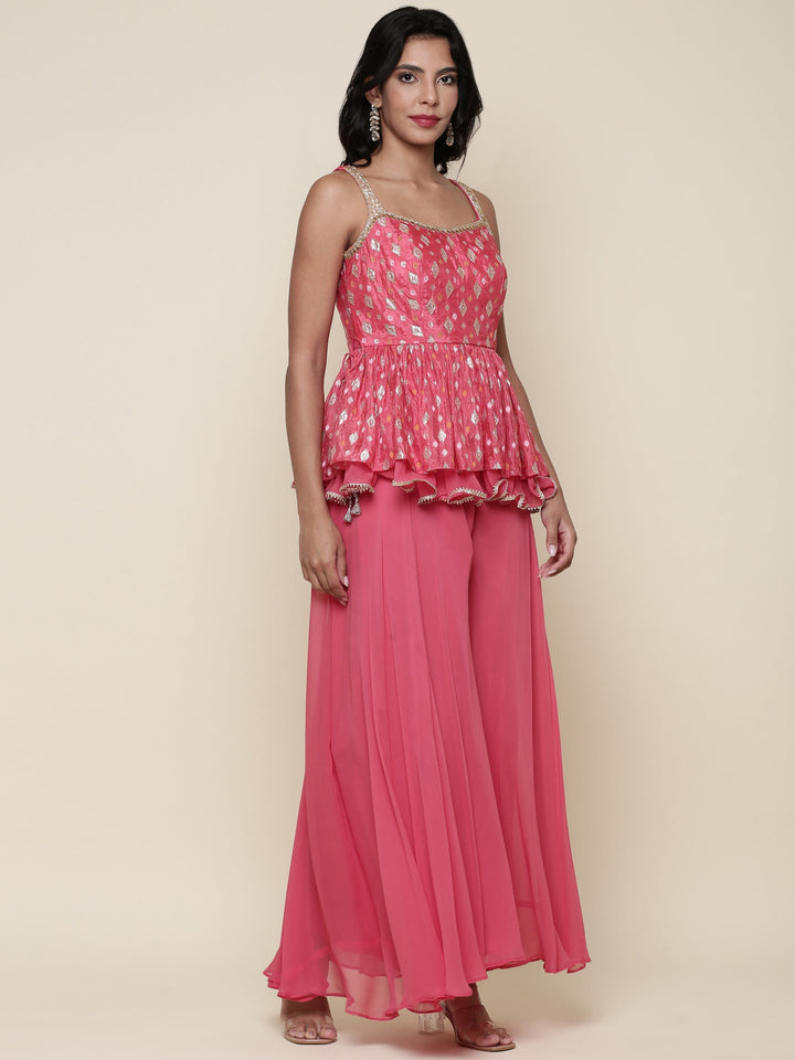 Neerus Orange georgette peplum suit set - back view