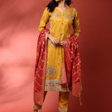 Mustard tissue fabric embroidered three piece suit set with contrast dupatta