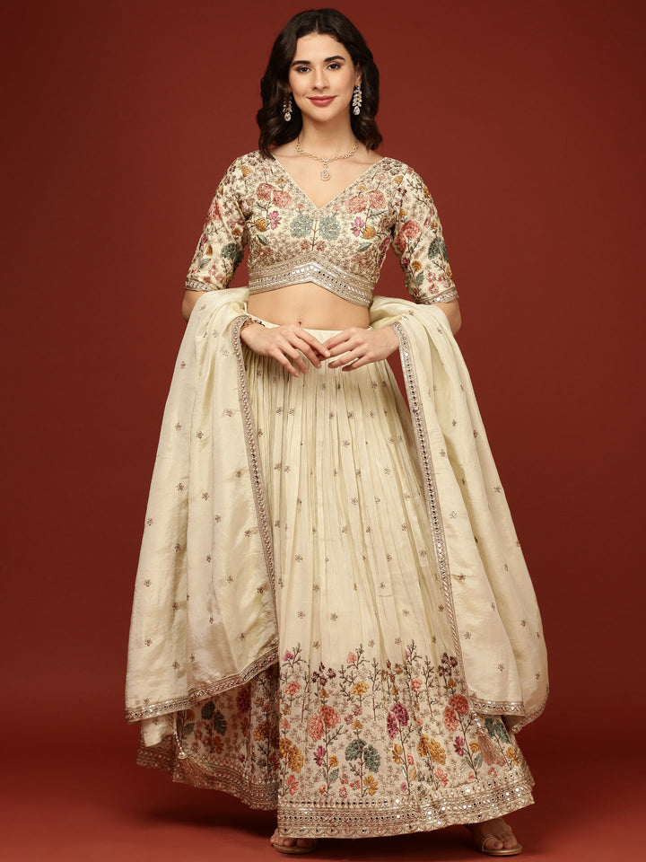 Neerus Beige silk embellished lehenga with floral motifs - front view