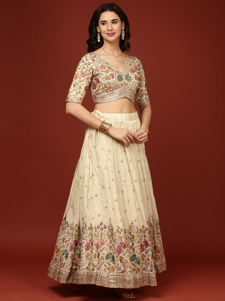 Neerus Beige silk embellished lehenga with floral motifs - back view