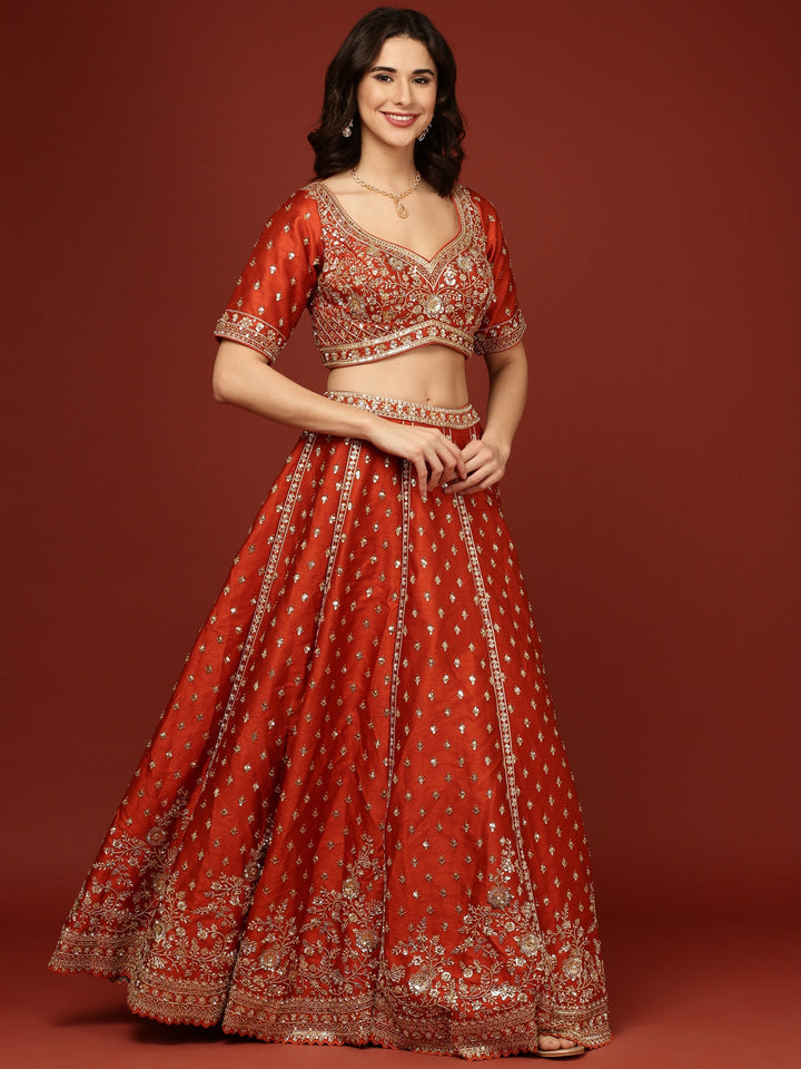 Neerus Orange silk hand embroidered lehenga set - back view