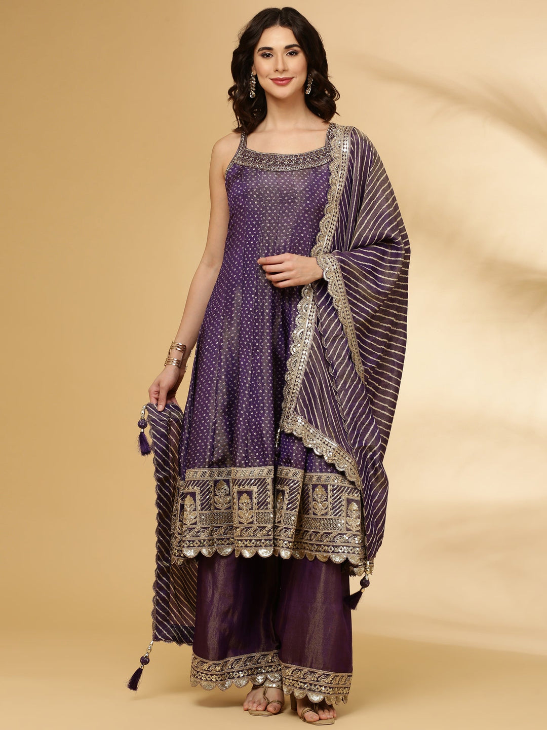 Neerus Purple tissue hand embroidered Anarkali suit set - front view