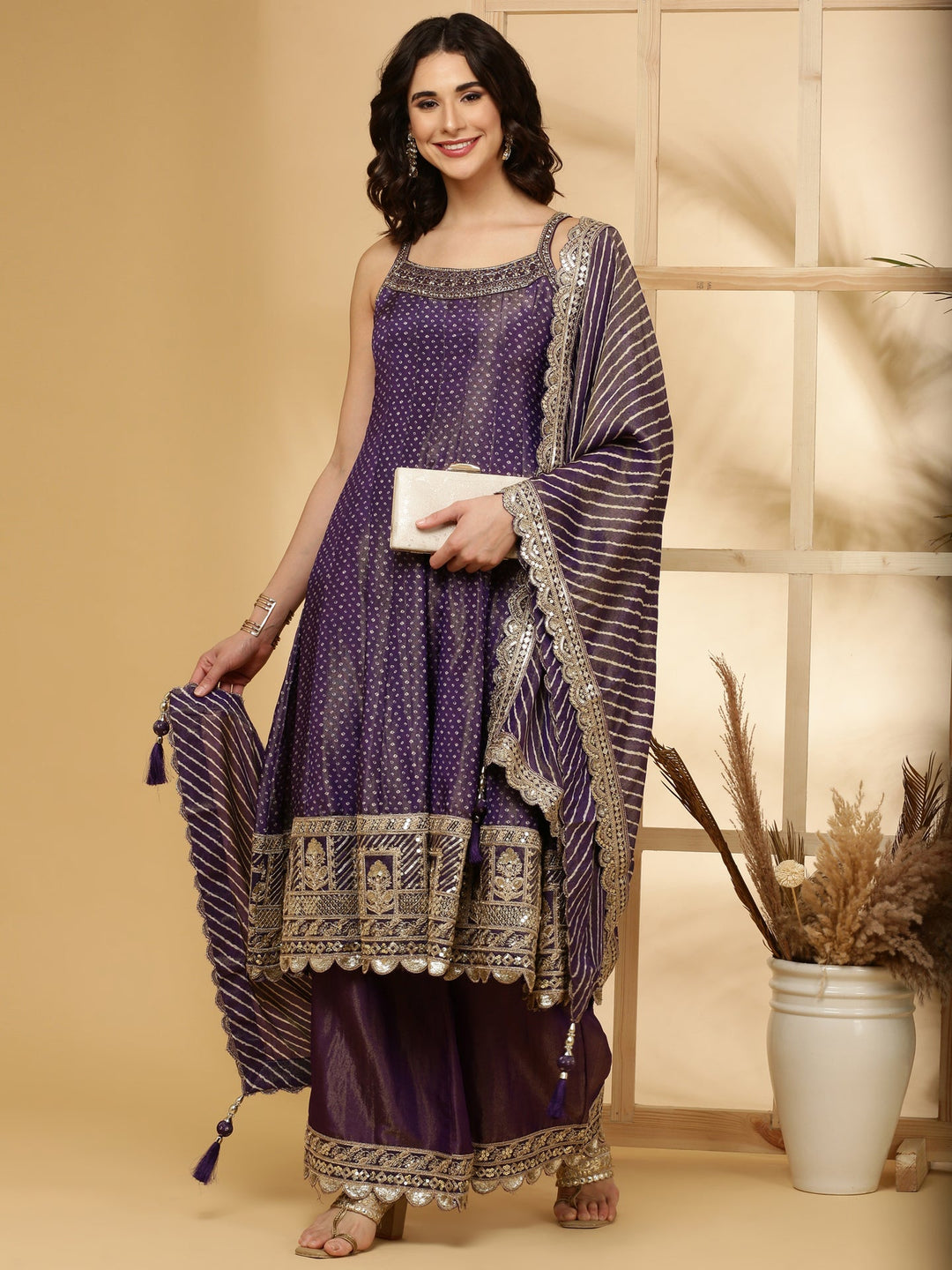 Neerus Purple tissue hand embroidered Anarkali suit set - back view