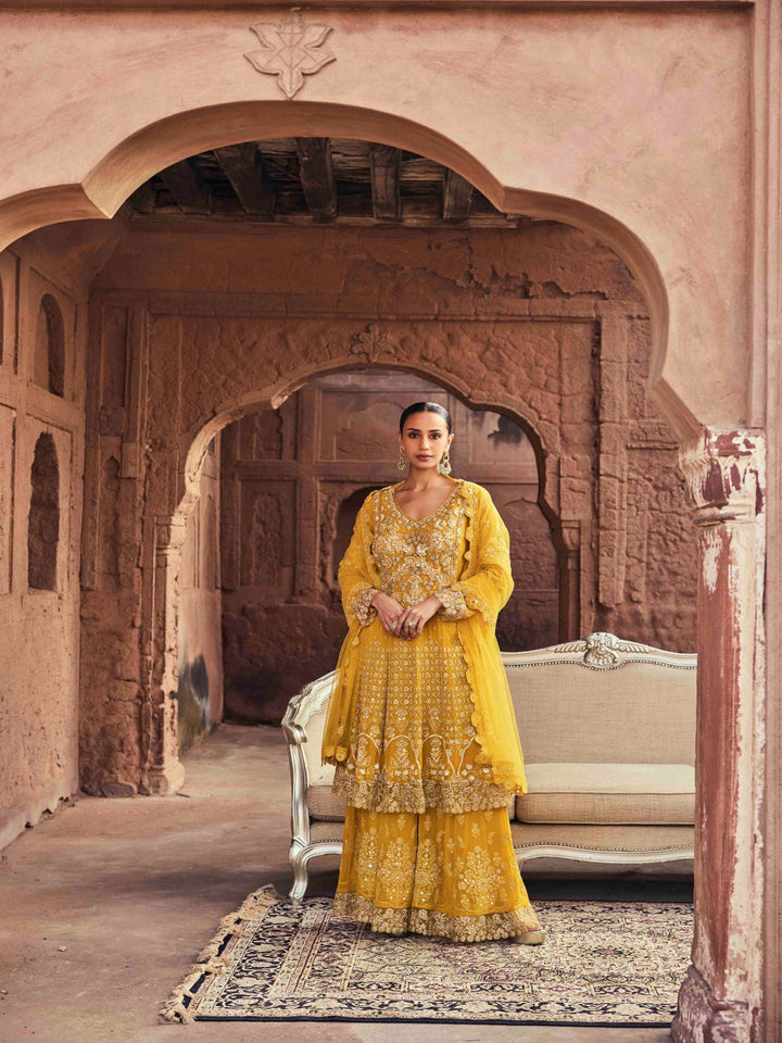 Neerus Yellow georgette embroidered suit set - front view