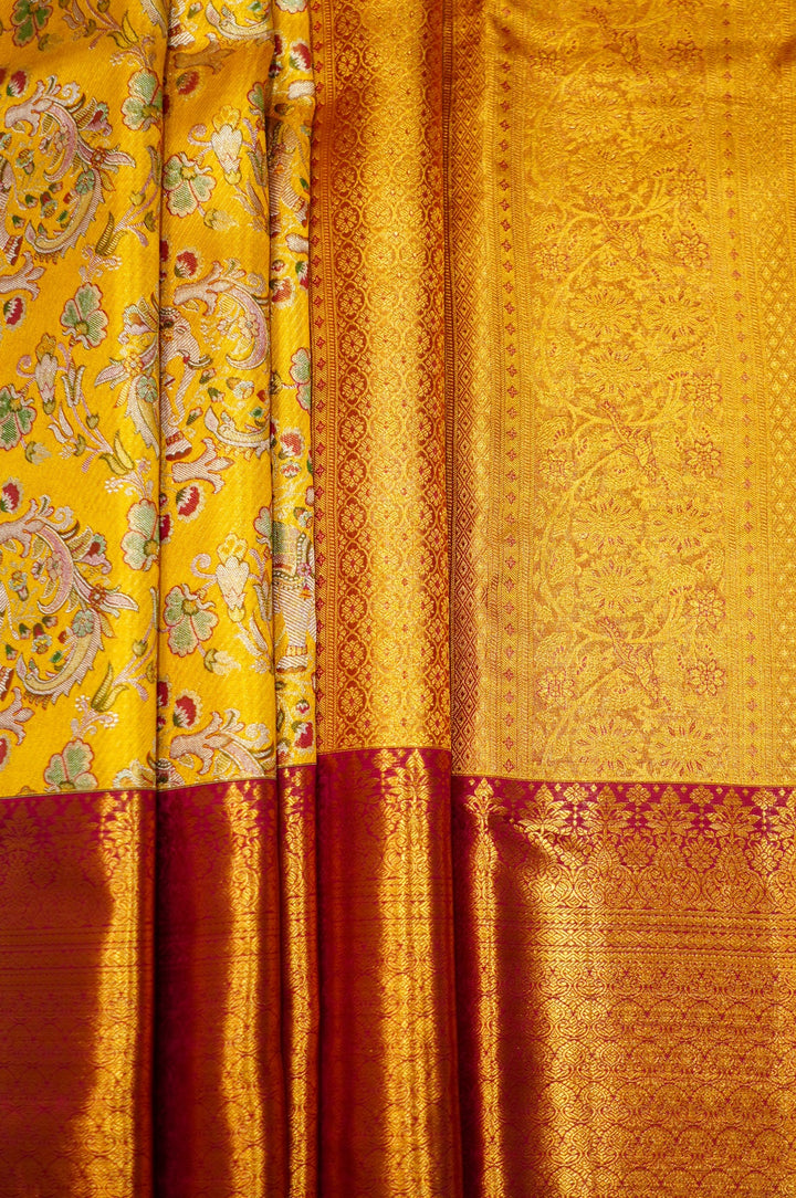 Neerus Yellow Pattu Silk Woven Saree - back view