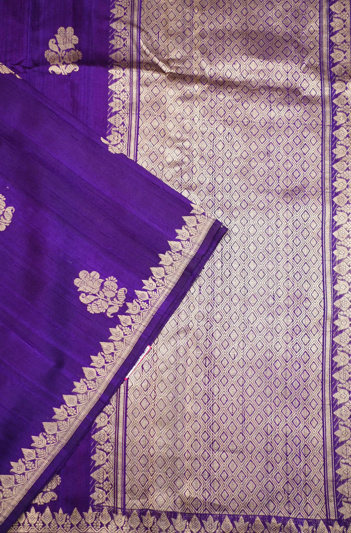 Neerus Purple silk woven saree with contrast blouse - back view