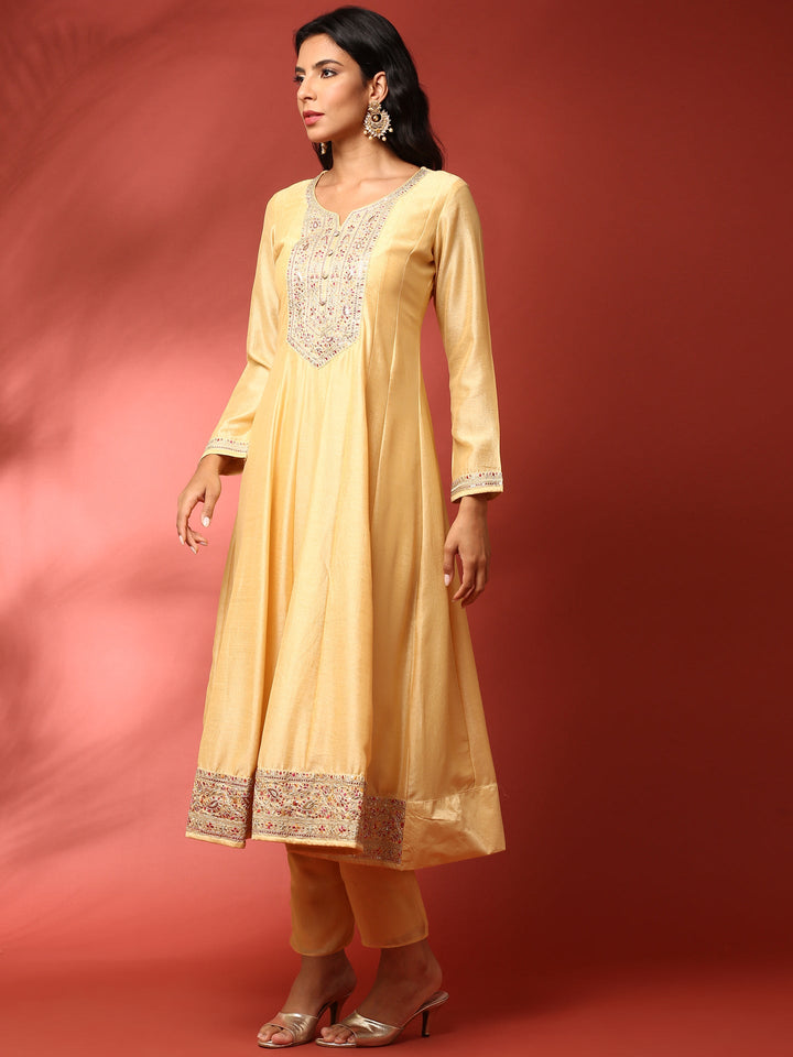 Neerus Yellow silk embroidered anarkali suit set - side view