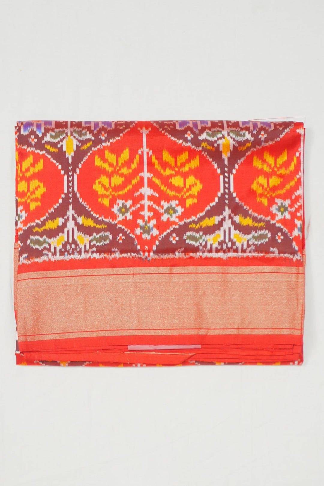 Neerus Red handloom ikat woven saree with multicolor border - side view