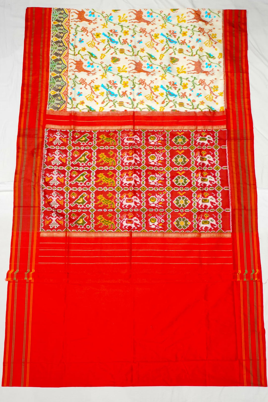 Neerus White silk woven patola saree - front view