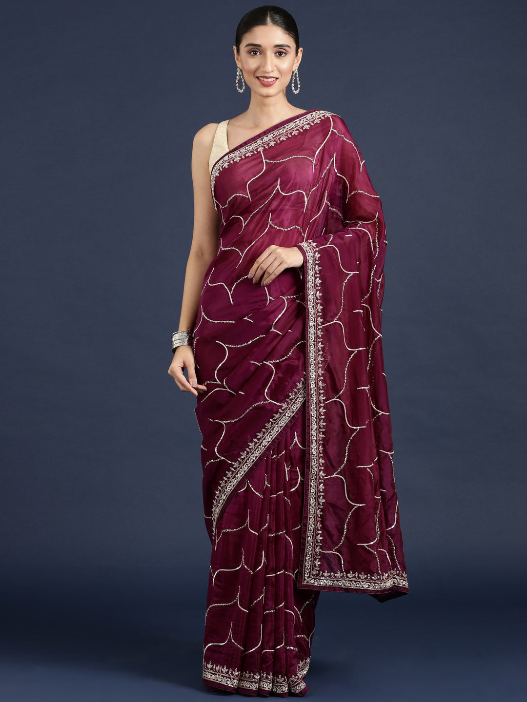 Neerus Maroon satin embellished saree - front view