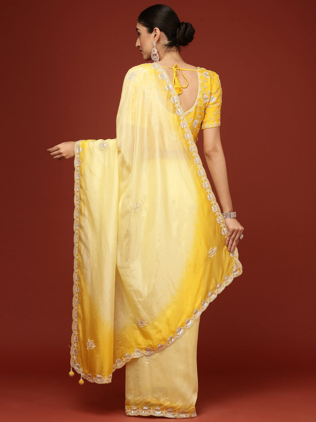 Neerus Yellow silk embellished saree with stone work - side view