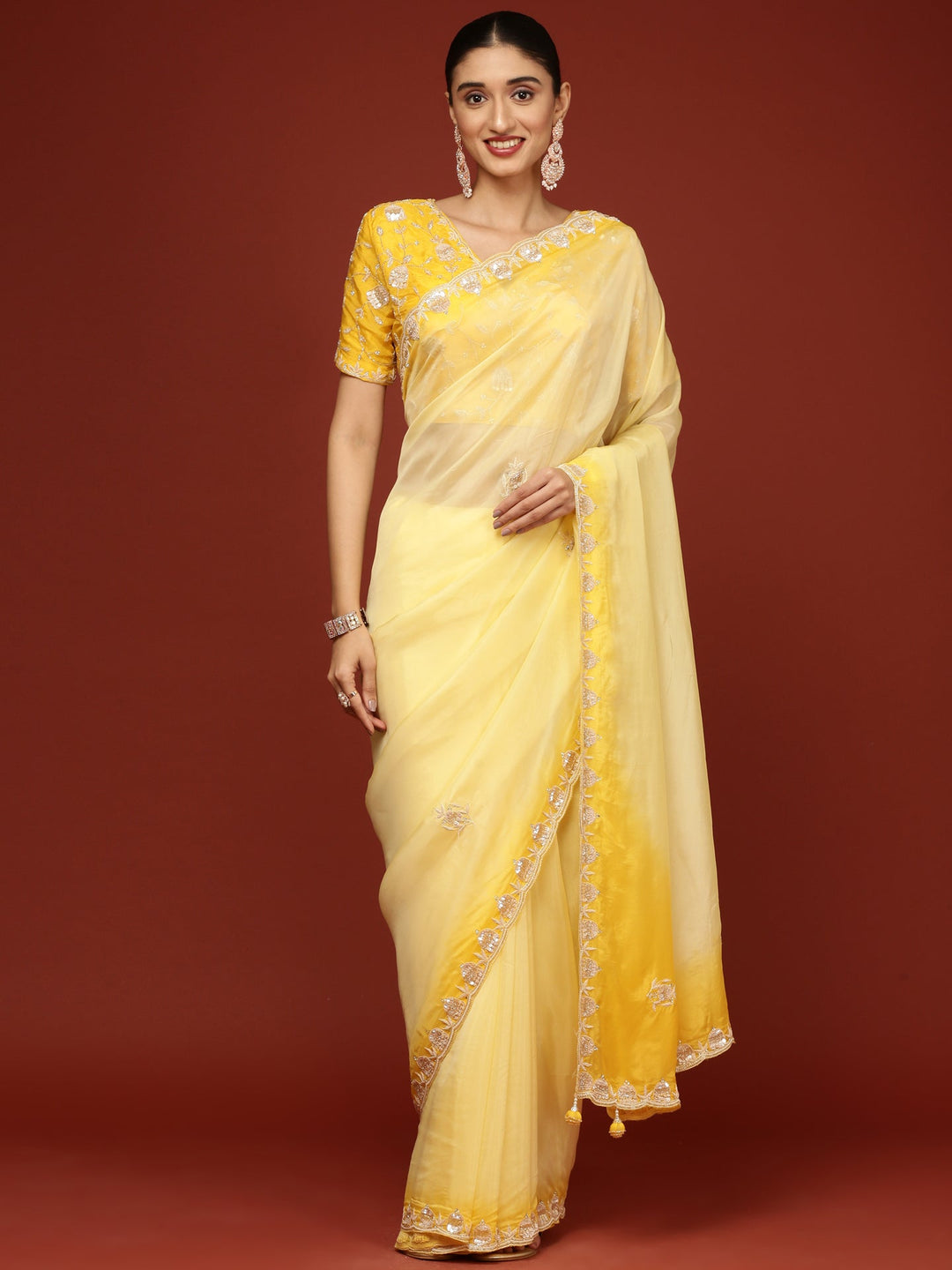 Neerus Yellow silk embellished saree with stone work - front view
