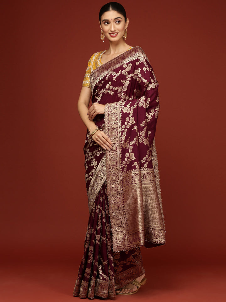 Neerus Maroon Banarasi woven saree with embroidered blouse - back view