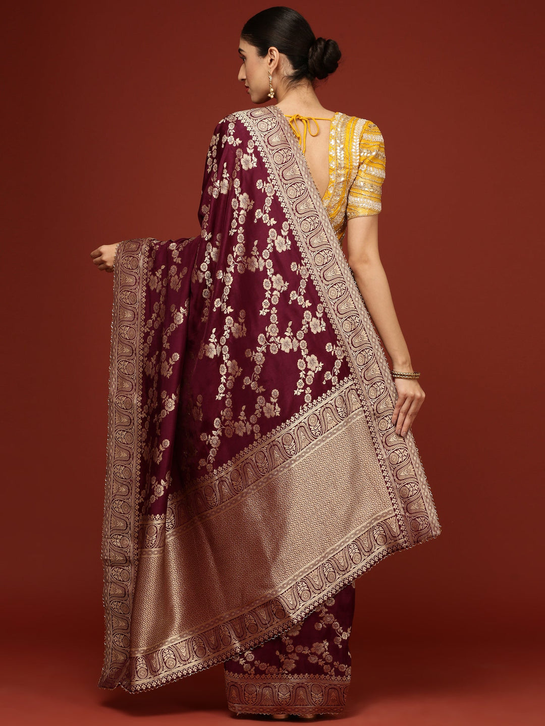 Neerus Maroon Banarasi woven saree with embroidered blouse - side view