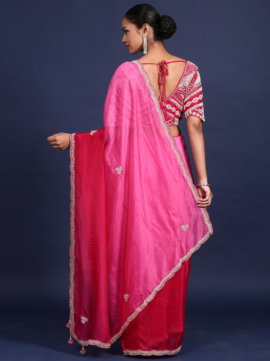 Neerus Pink crepe embroidered saree with readymade blouse - side view