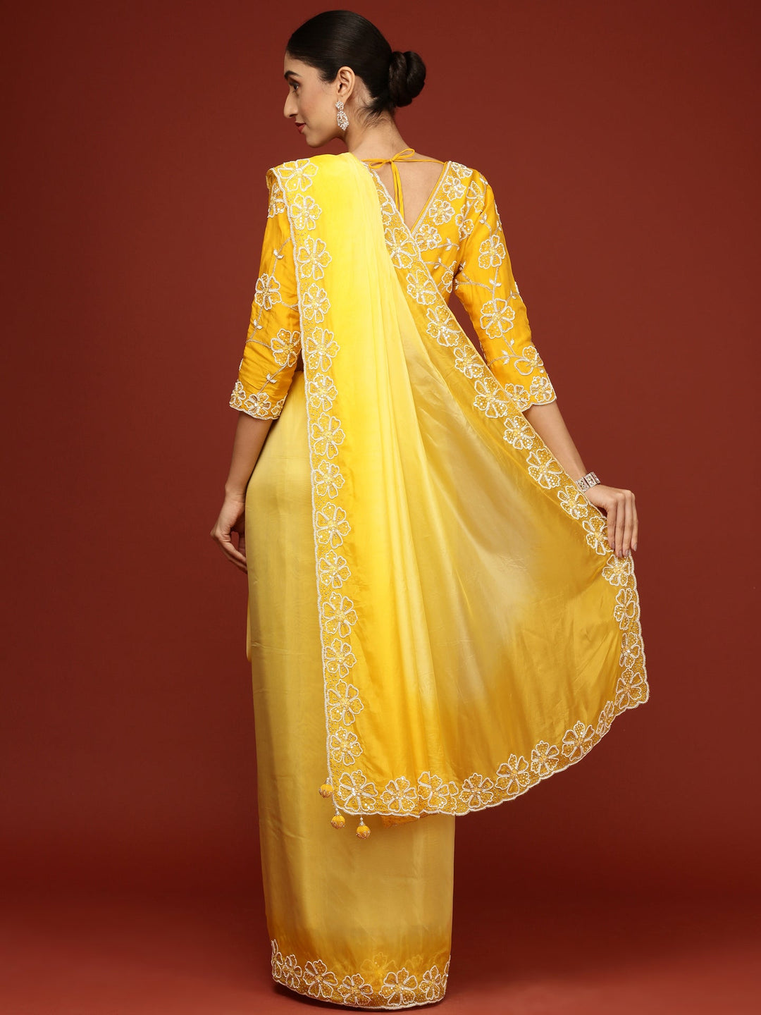 Neerus Yellow silk embellished saree with stone work - side view