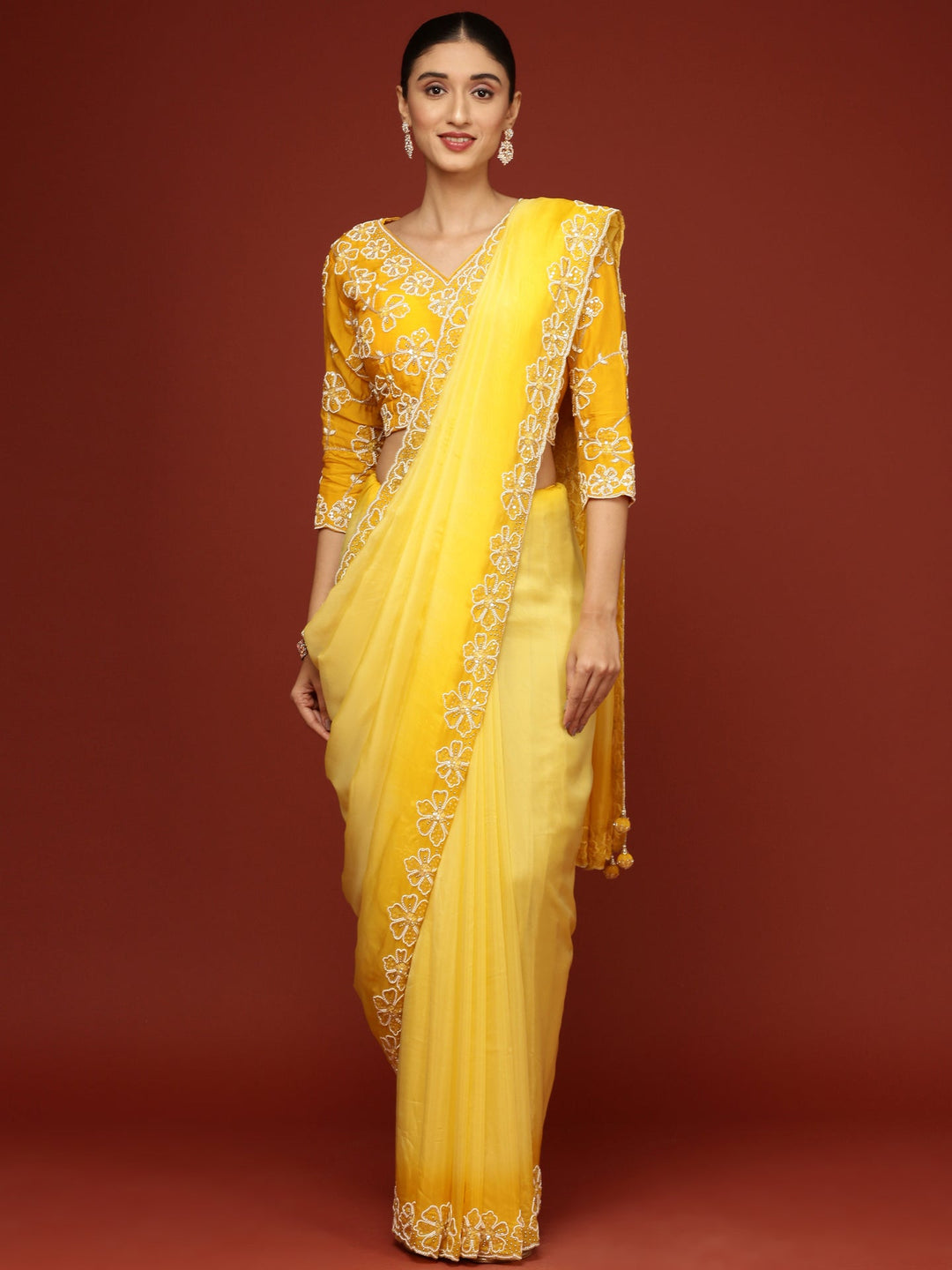 Neerus Yellow silk embellished saree with stone work - front view