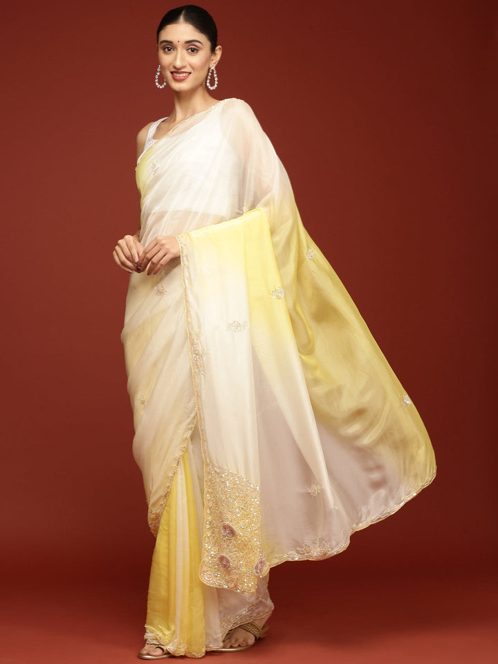 Neerus Yellow crepe embellished saree - back view