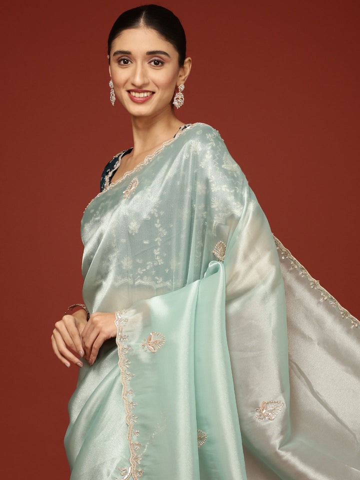 Neerus Blue tissue embellished saree with readymade blouse - side view