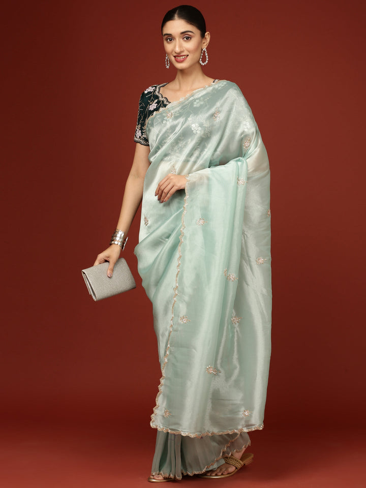 Neerus Green tissue hand embroidered saree with stone work - detail view 1