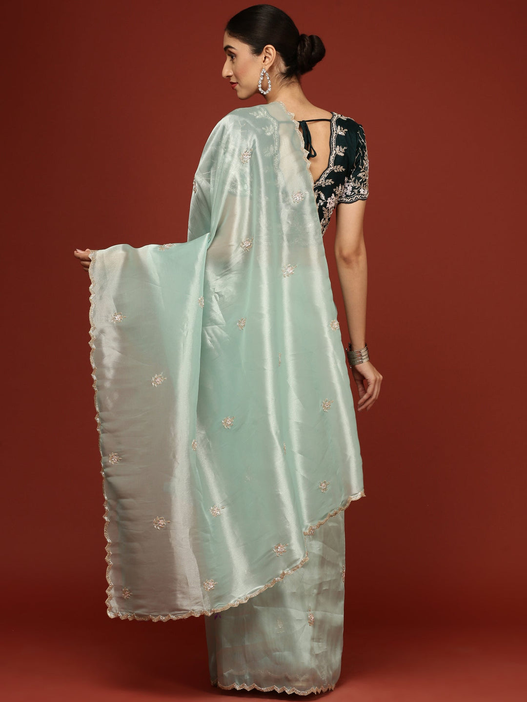 Neerus Green tissue hand embroidered saree with stone work - back view
