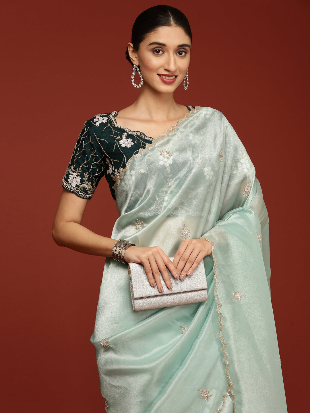 Neerus Green tissue hand embroidered saree with stone work - side view