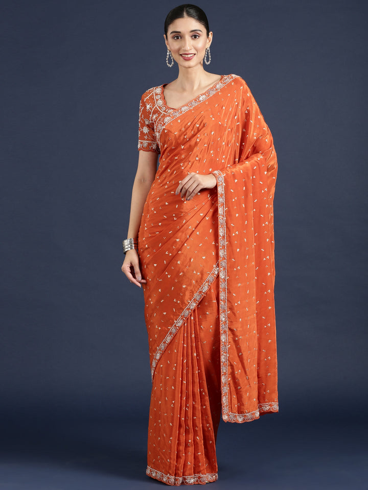 Neerus Orange crepe embellished saree with readymade blouse - detail view 1