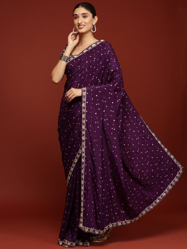 Neerus Purple crepe embellished saree with stone work - front view