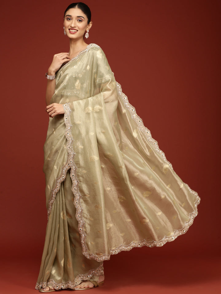 Neerus Green tissue embellished saree with readymade blouse - front view