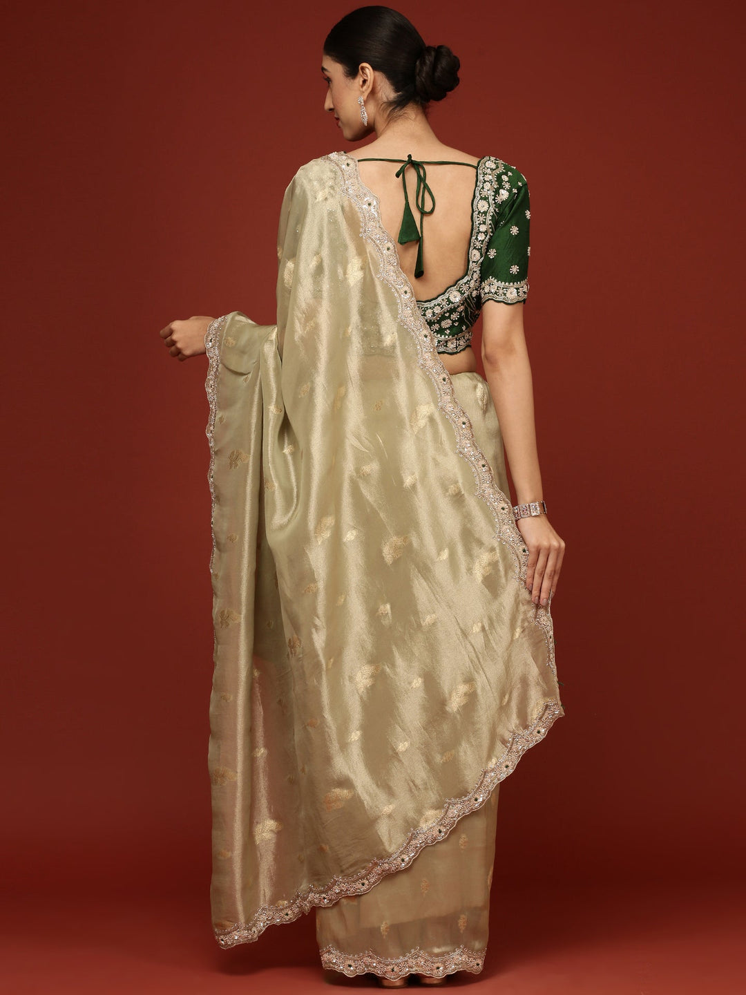 Neerus Green tissue embellished saree with readymade blouse - back view