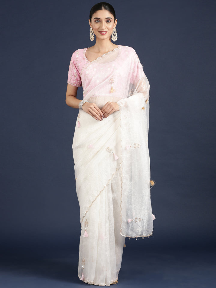 Neerus White crepe embroidered saree with blouse - front view