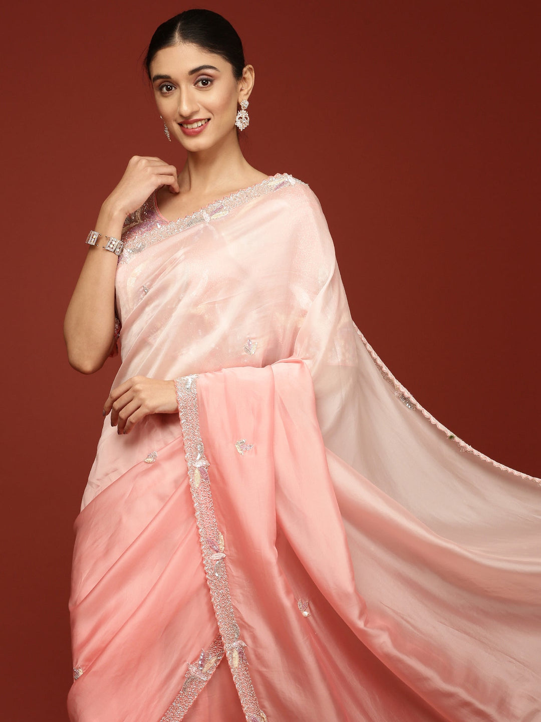 Neerus Pink crepe embellished saree with readymade blouse - side view