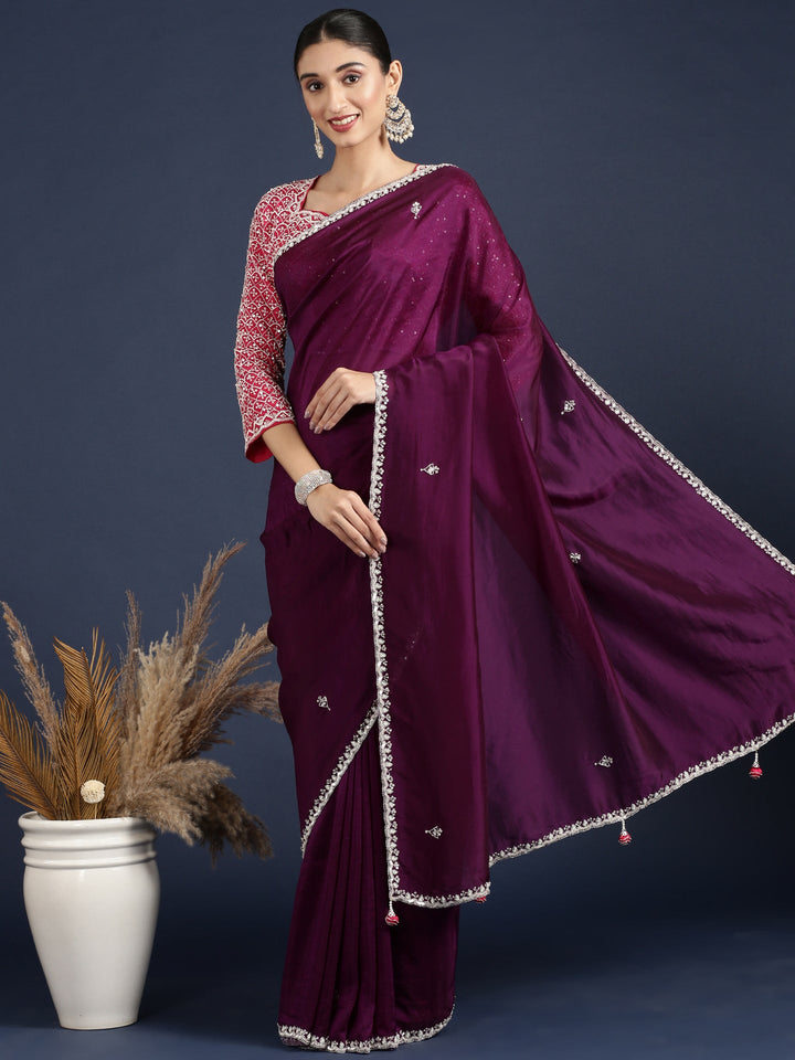 Neerus Purple crepe solid saree with contrast blouse - front view