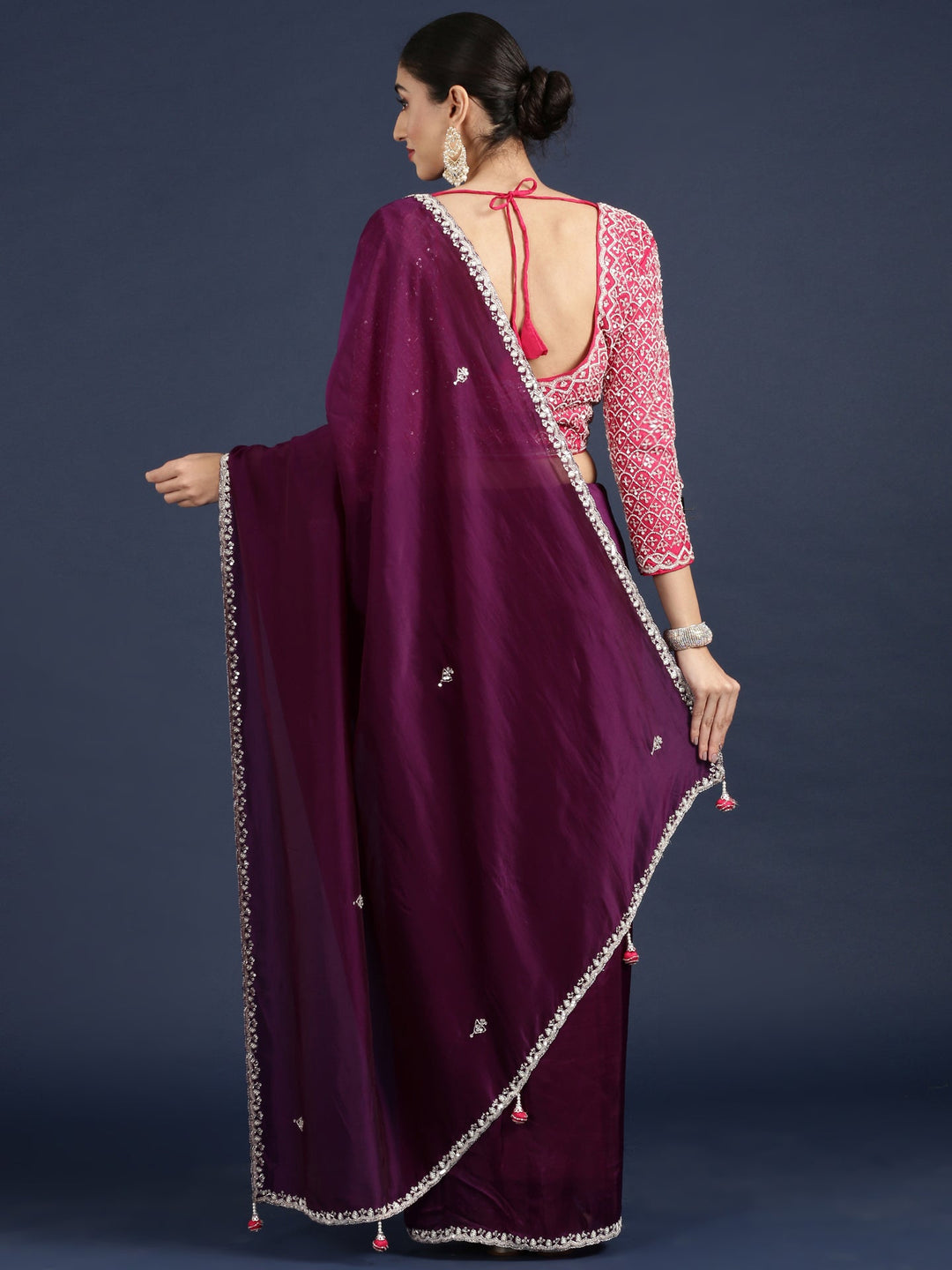 Neerus Purple crepe solid saree with contrast blouse - side view