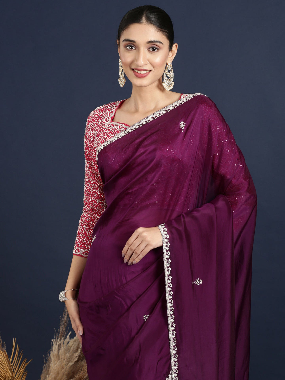 Neerus Purple crepe solid saree with contrast blouse - back view