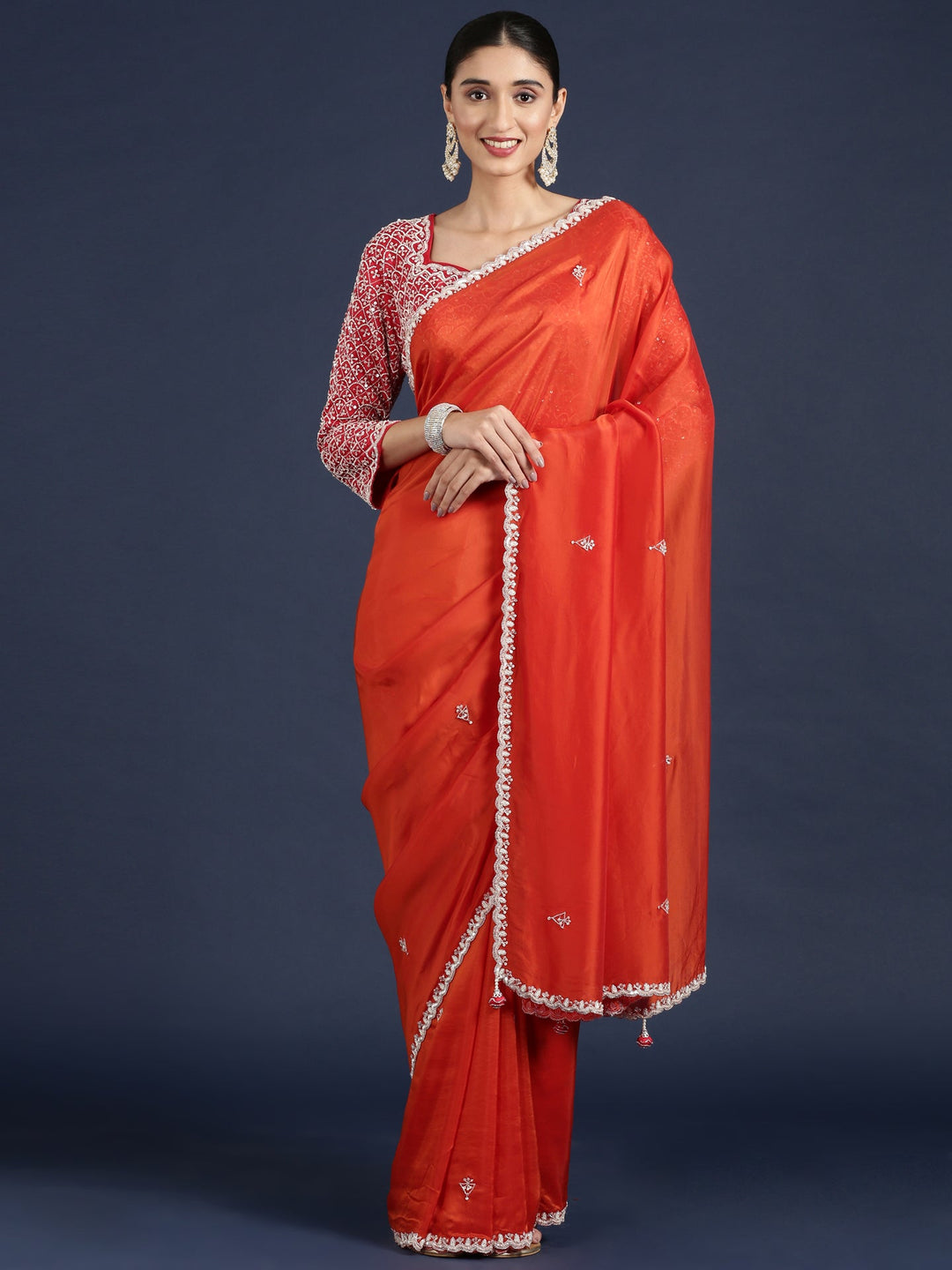 Neerus Orange crepe embellished saree with readymade blouse - detail view 1