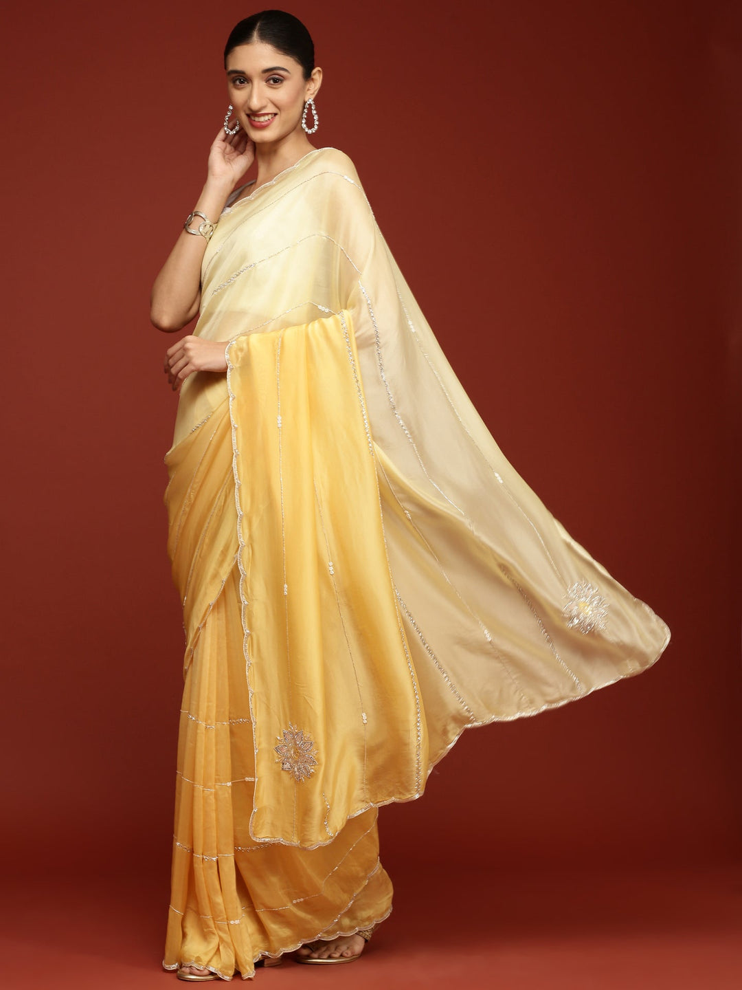Neerus Yellow crepe embroidered saree - back view