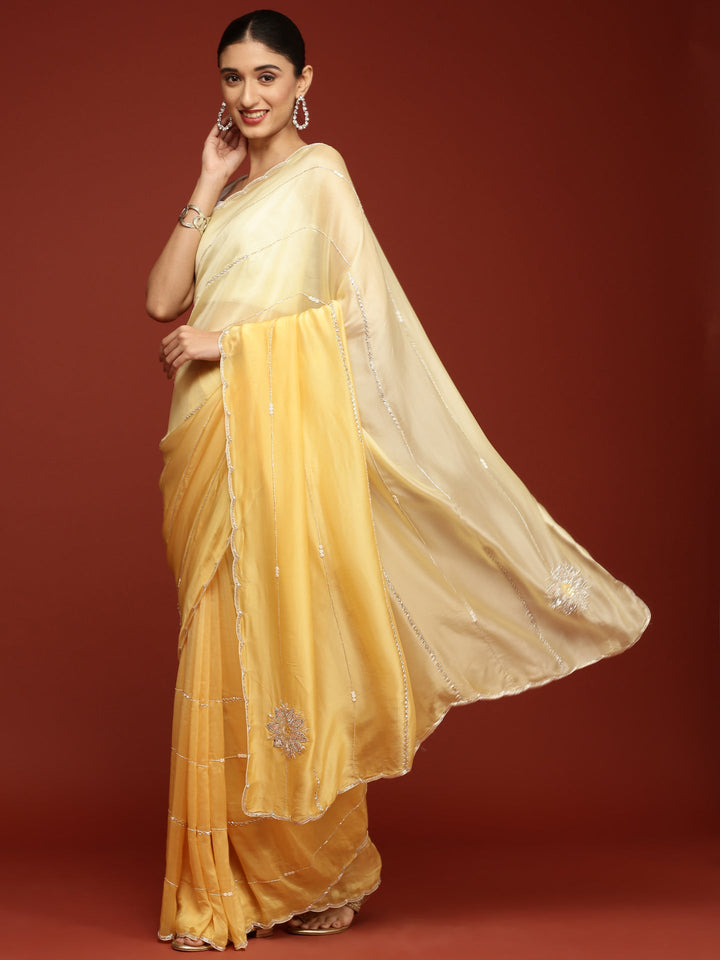 Neerus Yellow crepe embroidered saree - back view