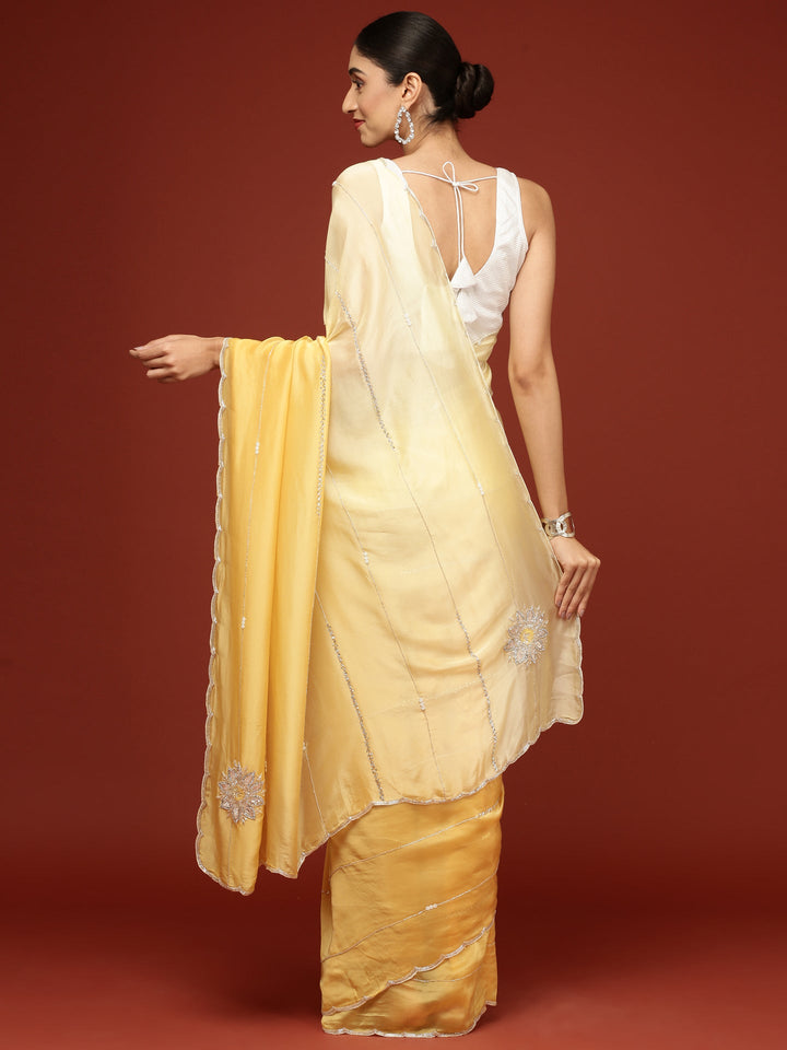Neerus Yellow crepe embroidered saree - side view